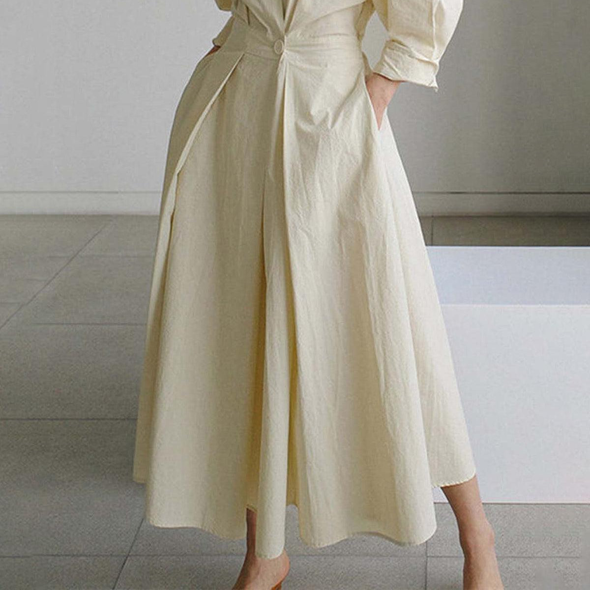 Elegant Solid Midi Dress with Notched Collar and Pockets Buttons