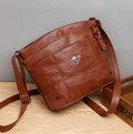 Elegant Vintage Shoulder Bag with Rich Patina and Timeless Style